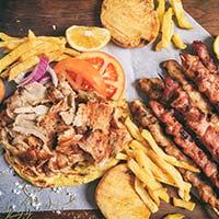 Hash House A Go Go’s Impact on The Plaza’s Culinary Scene 4 greek gyros on a pita bread P3WTR9W