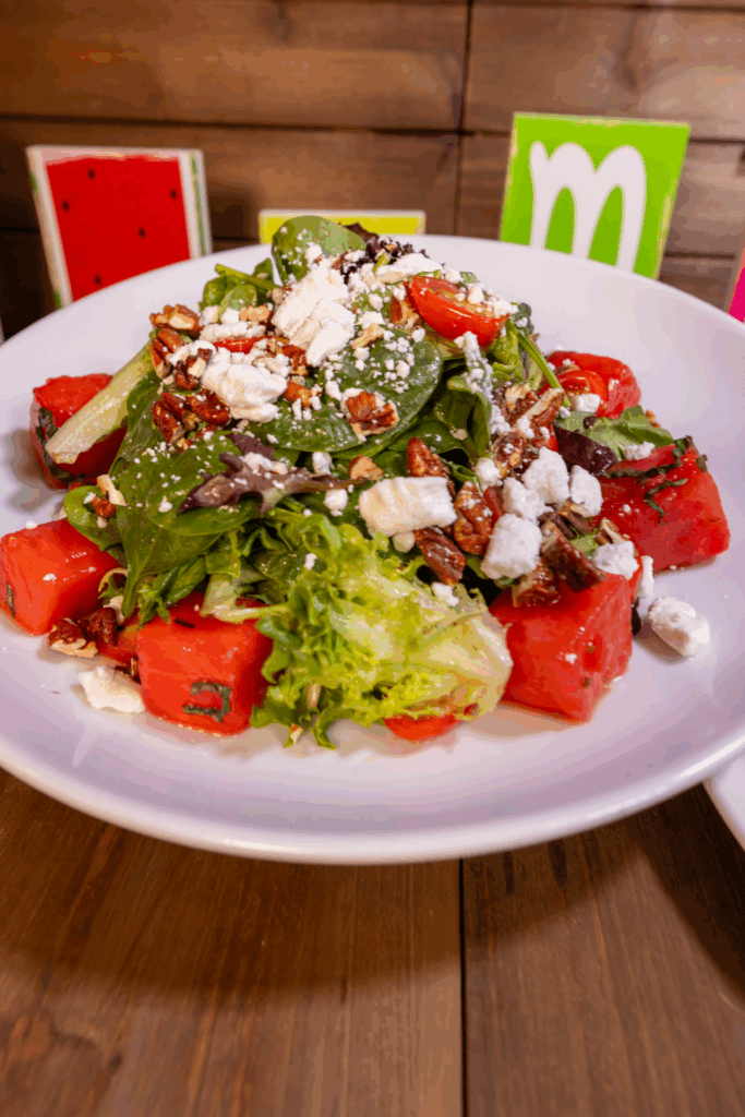 Seasonal Dishes and What’s New at Hash House A Go Go The Plaza 1 One of the most refreshing seasonal dishes at Hash House A Go Go—watermelon salad with feta, and lettuce.