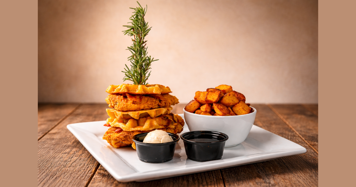 Chicken and waffle sandwich stack a spring seasonal menu item at Hash House A Go Go Plaza